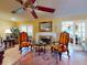 Living room with fireplace and comfortable seating at 103 Sea St, New Smyrna Beach, FL 32168