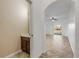 Small powder room with brown vanity and tile floor at 104 Kelly Thomas Way, Daytona Beach, FL 32124