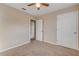 Bedroom with ceiling fan and access to another room at 104 Kelly Thomas Way, Daytona Beach, FL 32124