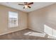 Well lit bedroom with ceiling fan and window blinds at 104 Kelly Thomas Way, Daytona Beach, FL 32124