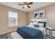 Well-lit bedroom with large bed and window coverings at 104 Kelly Thomas Way, Daytona Beach, FL 32124