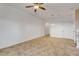 Open living area with tile floors and access to kitchen at 104 Kelly Thomas Way, Daytona Beach, FL 32124