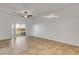 Living room with tile floor, sliding doors, and ceiling fan at 104 Kelly Thomas Way, Daytona Beach, FL 32124