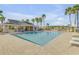 Community pool with lounge chairs and cabana at 104 Kelly Thomas Way, Daytona Beach, FL 32124