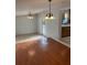 Dining area with hardwood and tile floors at 109 Western Ave, Edgewater, FL 32132