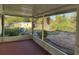 Spacious screened porch overlooking backyard with shed at 109 Western Ave, Edgewater, FL 32132