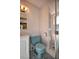 Clean bathroom with a shower and light blue toilet at 1120 Marcel St, New Smyrna Beach, FL 32168