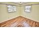 Bedroom with laminate wood floors and ceiling fan at 1120 Marcel St, New Smyrna Beach, FL 32168