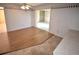 Light and airy dining area with wood flooring and built-in shelving at 1120 Marcel St, New Smyrna Beach, FL 32168