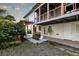 Exterior of house with walkway and landscaping at 1324 N Peninsula Ave, New Smyrna Beach, FL 32169