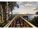 Wooden dock extending over the water at 1324 N Peninsula Ave, New Smyrna Beach, FL 32169