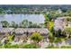 Aerial view of townhouse community near lake at 137 Grey Widgeon Ct, Daytona Beach, FL 32119