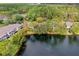 Aerial view of townhouse community near lake at 137 Grey Widgeon Ct, Daytona Beach, FL 32119