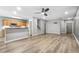 Kitchen with light wood cabinets, a breakfast bar, and stainless steel appliances at 137 Grey Widgeon Ct, Daytona Beach, FL 32119