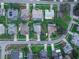 Overhead view of neighborhood showcasing homes and street layout at 1381 S Wembley Cir, Port Orange, FL 32128