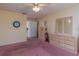 Bedroom with ceiling fan and ample closet space at 1381 S Wembley Cir, Port Orange, FL 32128