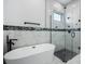 Modern bathroom with soaking tub and glass shower at 142 Sandpiper Ridge Dr, Ormond Beach, FL 32176