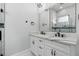 Double vanity bathroom with marble countertops at 142 Sandpiper Ridge Dr, Ormond Beach, FL 32176