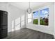 Bright breakfast nook with hardwood floors and large windows at 142 Sandpiper Ridge Dr, Ormond Beach, FL 32176