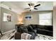 Cozy living room with sectional sofa and view into the kitchen at 144 Ellison Ave, New Smyrna Beach, FL 32168