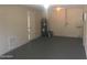 Spacious basement offering potential for storage or customization with a clean, painted floor at 1500 Wildrose Ln, Daytona Beach, FL 32117