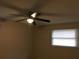 Bedroom with ceiling fan and window blinds at 1500 Wildrose Ln, Daytona Beach, FL 32117