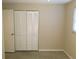 Built-in closet with shelves and hanging rod at 1500 Wildrose Ln, Daytona Beach, FL 32117