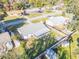 Aerial view showing house, backyard, and neighborhood context at 18 Wildwood Dr, Edgewater, FL 32132