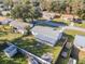 Aerial view showing house, backyard, and surrounding neighborhood at 18 Wildwood Dr, Edgewater, FL 32132