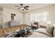 Living room featuring hardwood floors, a neutral color palette, and ample natural light at 18 Wildwood Dr, Edgewater, FL 32132