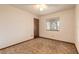 Simple bedroom with carpeted floors, a ceiling fan, and a window with blinds at 1820 Sabal Palm Dr, Edgewater, FL 32132