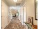 View through the entryway to living room with tile flooring at 1846 Turnbull Lakes Dr, New Smyrna Beach, FL 32168