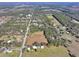 Wide aerial view of the property and surrounding area at 187 N Samsula Dr, New Smyrna Beach, FL 32168