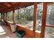 Relaxing screened porch overlooking the backyard at 187 N Samsula Dr, New Smyrna Beach, FL 32168