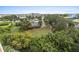 Aerial view of property with expansive green space and water views at 2 Riverwalk Dr # 502, New Smyrna Beach, FL 32169