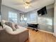 Cozy bedroom with wood floors, a daybed, and window seating at 2202 Venetian Ave, Belle Isle, FL 32809