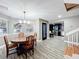 Formal dining room with round table and chandelier at 2202 Venetian Ave, Belle Isle, FL 32809