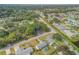 Aerial view of a house and surrounding neighborhood at 2304 Date Palm Dr, Edgewater, FL 32141