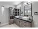 Elegant bathroom with double vanity and custom cabinetry at 2304 Date Palm Dr, Edgewater, FL 32141