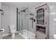 Updated bathroom with glass shower and built-in shelving at 2304 Date Palm Dr, Edgewater, FL 32141