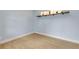 Light and bright bedroom with wood-look flooring and shelving at 2304 Date Palm Dr, Edgewater, FL 32141