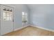 Simple bedroom with light walls and wood-look flooring at 2304 Date Palm Dr, Edgewater, FL 32141