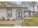 Front entry of a newly remodeled home with walkway at 2304 Date Palm Dr, Edgewater, FL 32141