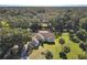 Aerial view of home with driveway and landscaping at 2322 Melonie Trl, New Smyrna Beach, FL 32168