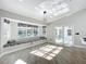 Sunlit dining area, featuring a built-in window seat and sliding glass doors at 2322 Melonie Trl, New Smyrna Beach, FL 32168