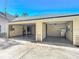 Spacious two-car garage with painted floor and extra storage at 2322 Melonie Trl, New Smyrna Beach, FL 32168