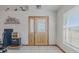 Bright entryway with wood door and tiled floor at 239 Kirkland Rd, New Smyrna Beach, FL 32169