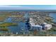 Aerial view of waterfront condo community with boat slips at 3 Riverwalk Dr # 302, New Smyrna Beach, FL 32169