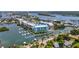 Wide aerial view of waterfront condo building and marina at 3 Riverwalk Dr # 401, New Smyrna Beach, FL 32169