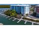 Waterfront building, boat docks and lush landscaping at 3 Riverwalk Dr # 401, New Smyrna Beach, FL 32169